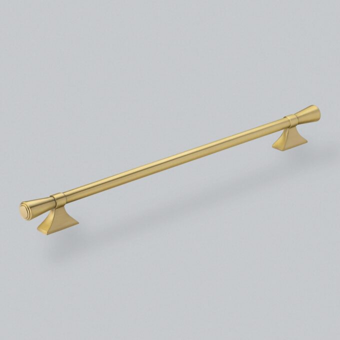 Brass curtain rod with decorative finials on grey background.