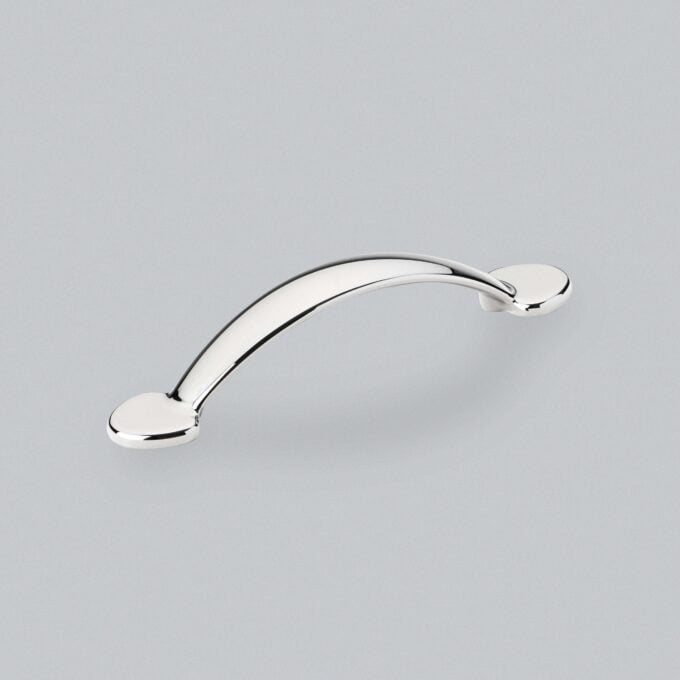 Polished chrome cabinet handle on grey background