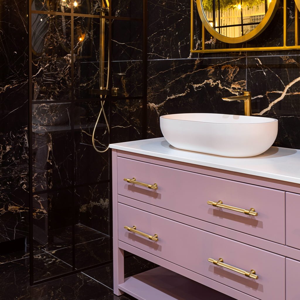 Belgravia-Brushed-satin-brass-handle-on-pink-bathroom-vanity-unit