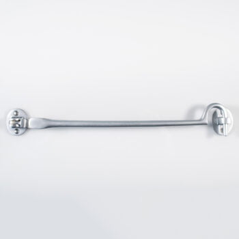 Long silver ratchet spanner on white background