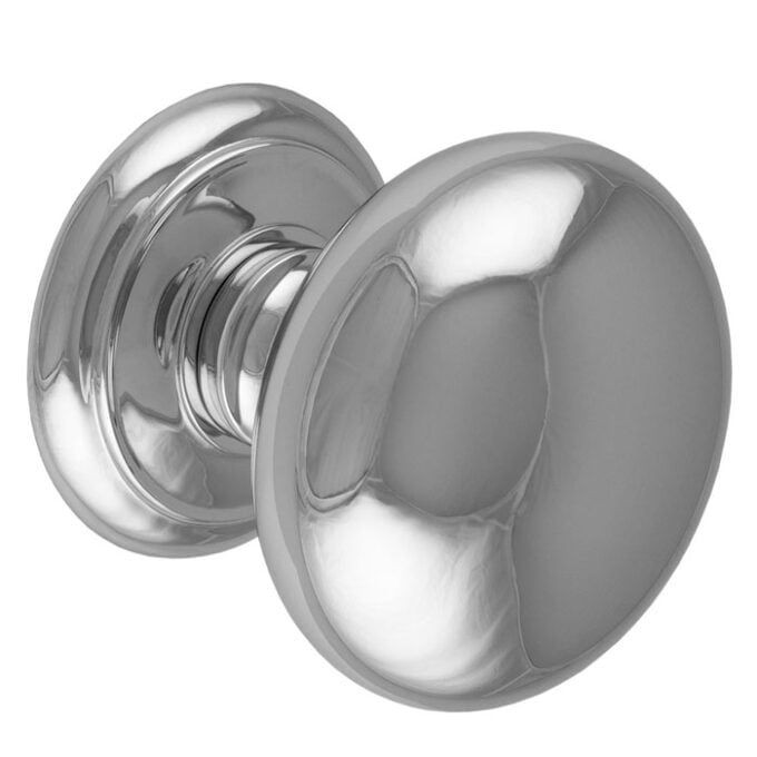 Chrome door knob on white background.