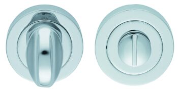 Chrome shower controls, one knob turned, one centered.