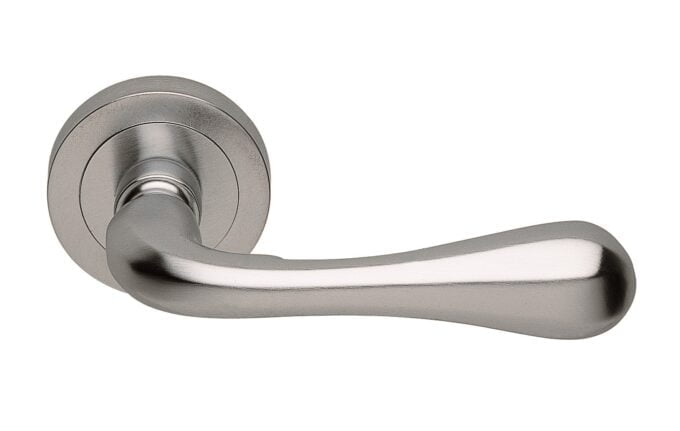 Stainless steel modern door handle isolated on white