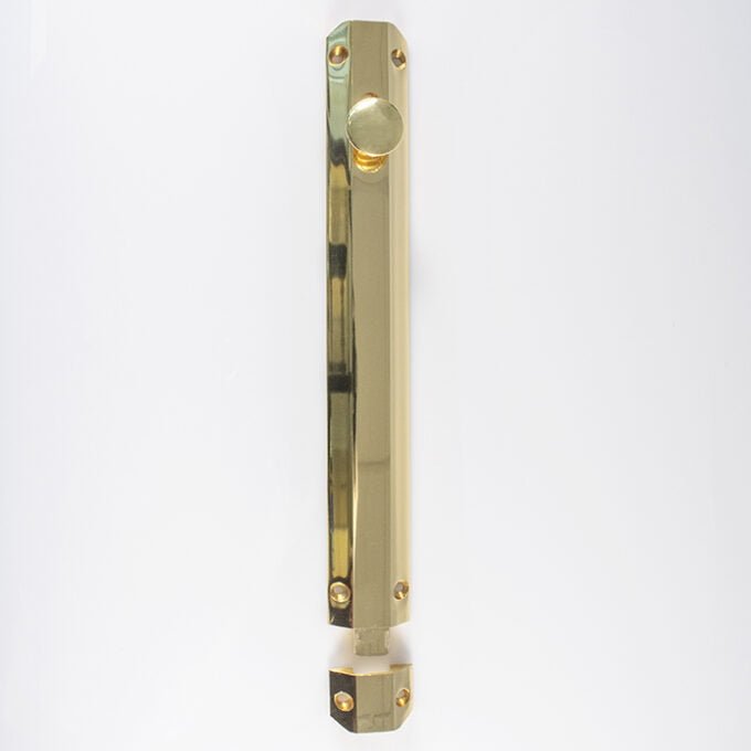 Brass door push plate on white background