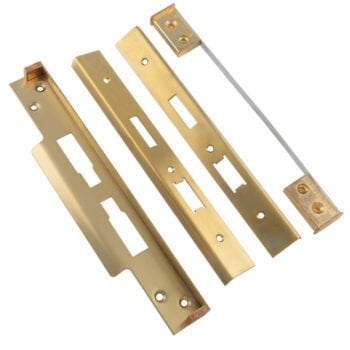 Brass door reinforcement plates with lock cut-outs.