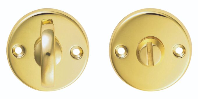 Gold bathroom thumbturn lock set on white background.