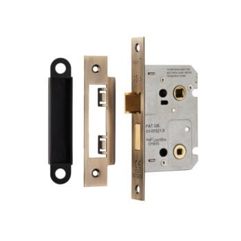 Brass mortice lock and keyhole plates isolated on white.