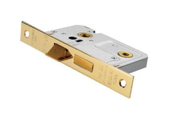 Gold and silver door latch mechanism.