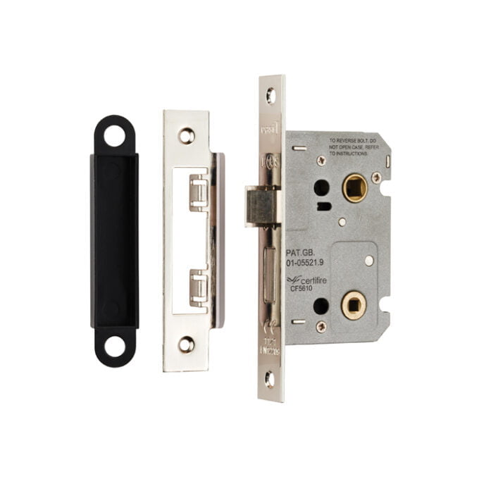 Disassembled door lock mechanism on white background