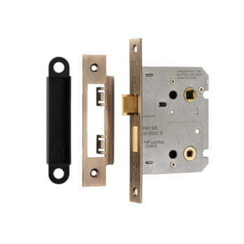 Brass mortice lock and faceplate on white background