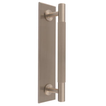 Brushed nickel door handle with modern design.