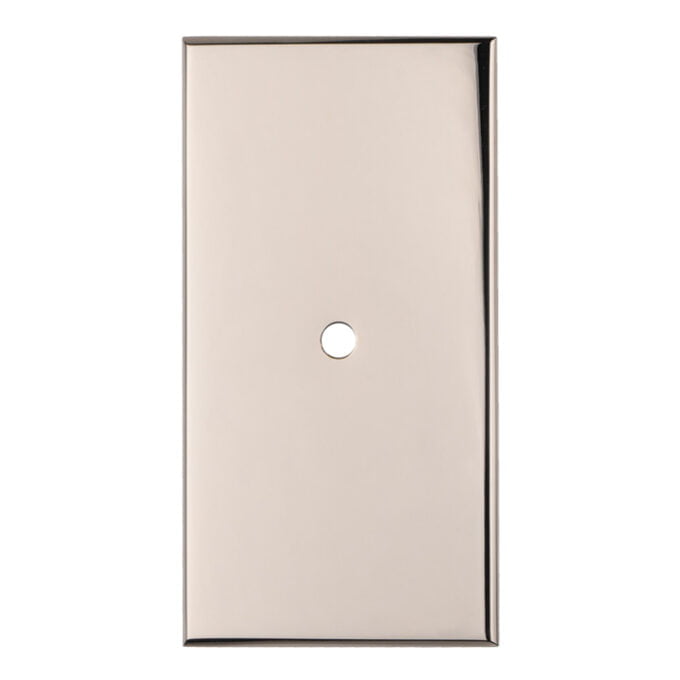 Beige light switch plate on white background.