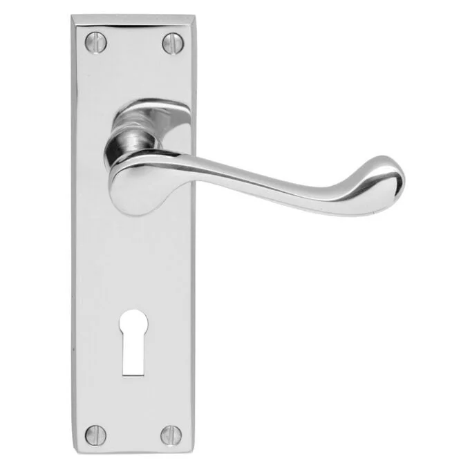 Shiny metal door handle on plate