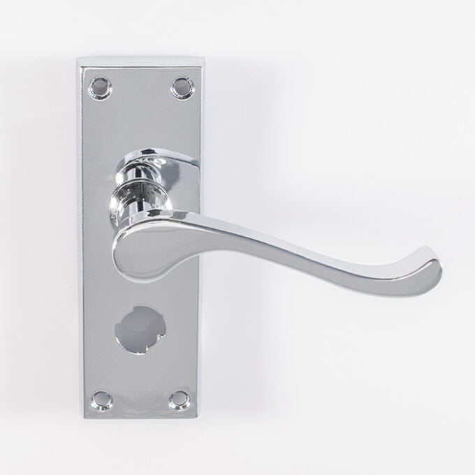 Chrome door handle on white rectangular backplate