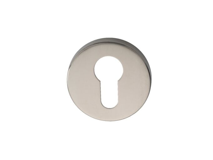 Close-up of silver keyhole on white background.