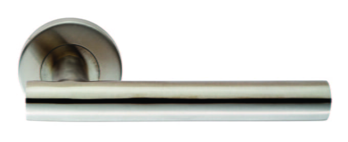 Stainless steel door handle on white background.