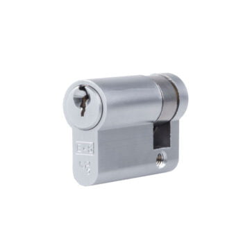 Silver cylinder lock with key on white background.