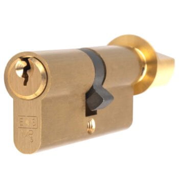 Brass cylinder lock with key inserted.