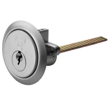 Round cam lock with key on white background.