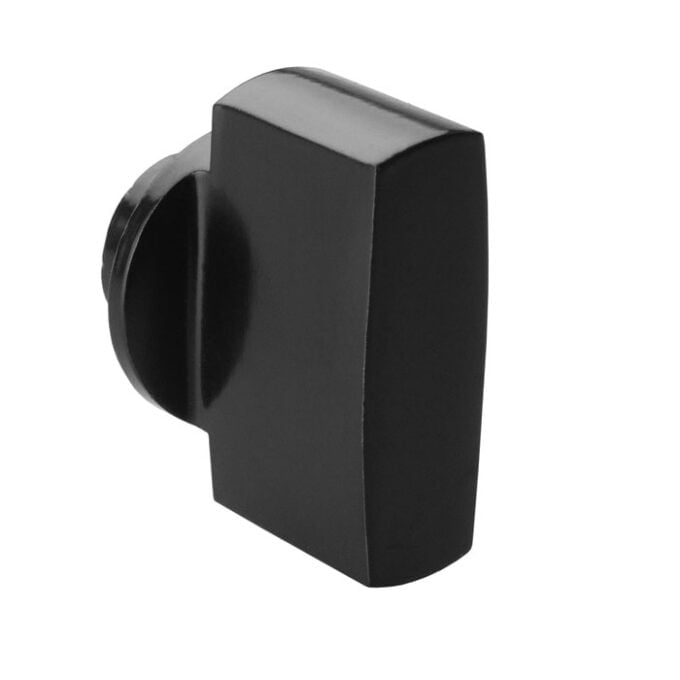 Black plastic electronic knob on white background.