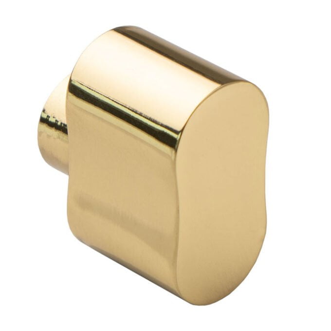 Gold-coloured drawer knob on white background.