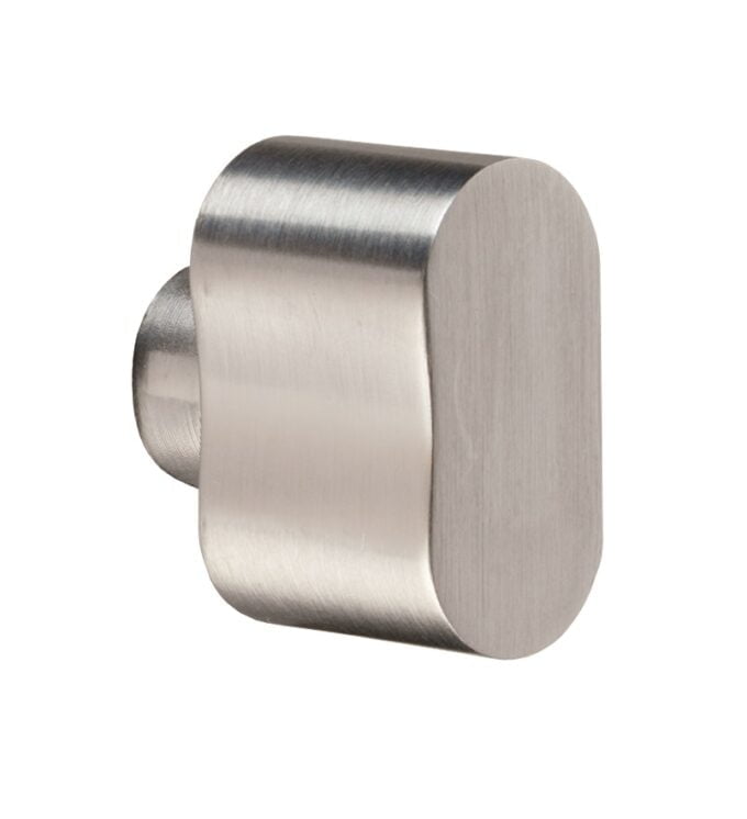 Stainless steel door stop on white background.