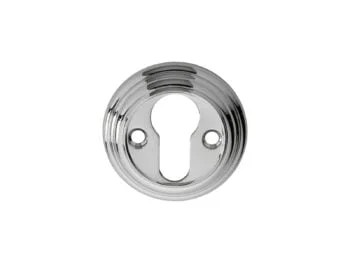 Polished chrome keyhole on a circular escutcheon plate.