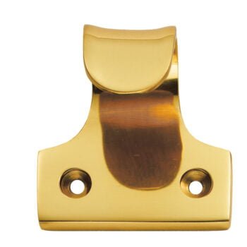 Brass clipboard clip on white background.